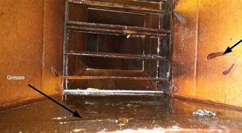 Grease build-up inside kitchen exhaust duct before ozone treatment
