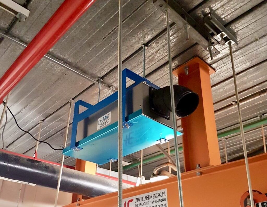 Singapore shopping center, SG-7000 installation in grease trap room.